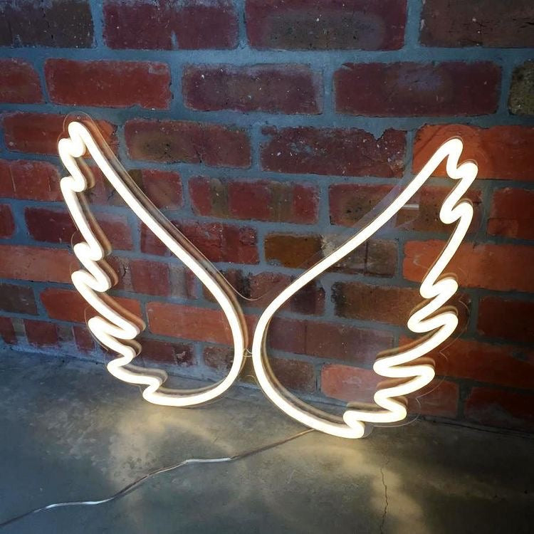 warm white wings neon sign